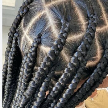 Box braids_longues_épaisseurs moyennes_femme_sur_cheveux frisés