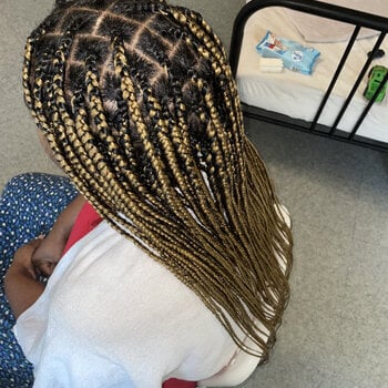 Knotless Braids sur cheveux crépus longs