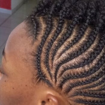 Nattes collées sur cheveux naturels
