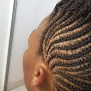 Nattes collées sur cheveux naturels