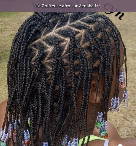 Nattes sur cheveux naturels avec perles