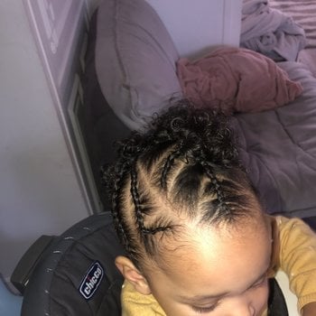 Tresses collées sur cheveux métissés